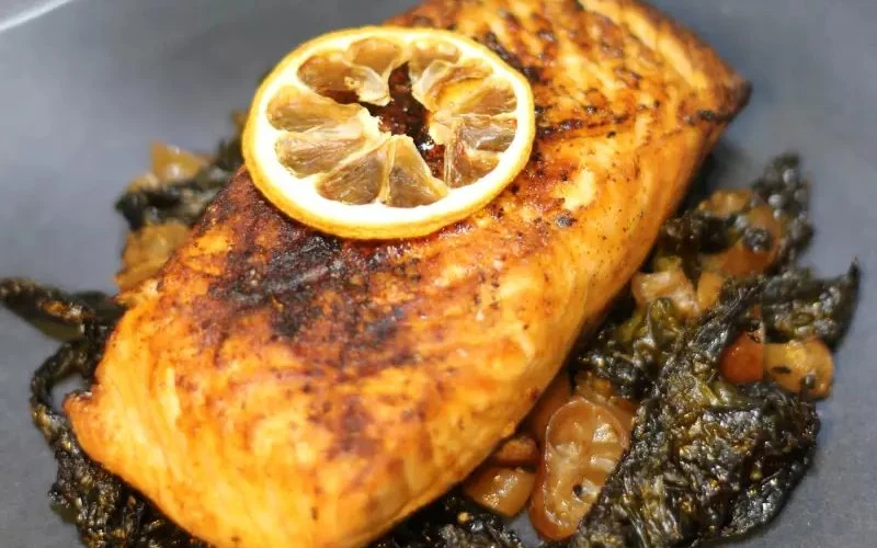 Golden regional salmon on Strait seaweeds with crisp luche and lemon