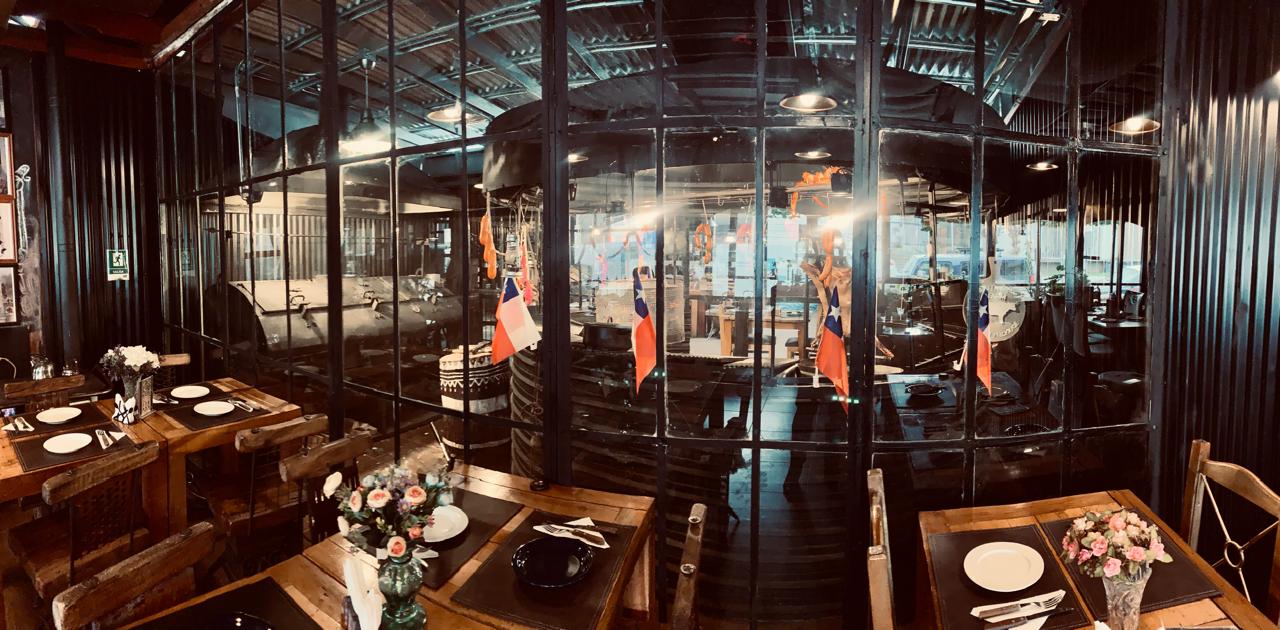 The dining room and open-fire kitchen at Speechless Patagonia